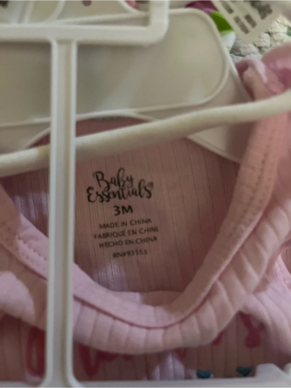 Baby Essentials Pink Ribbed One-Piece with Floral Bow Accent